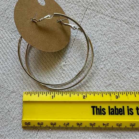 Silver toned medium hoop bangle earrings - Picture 4 of 4